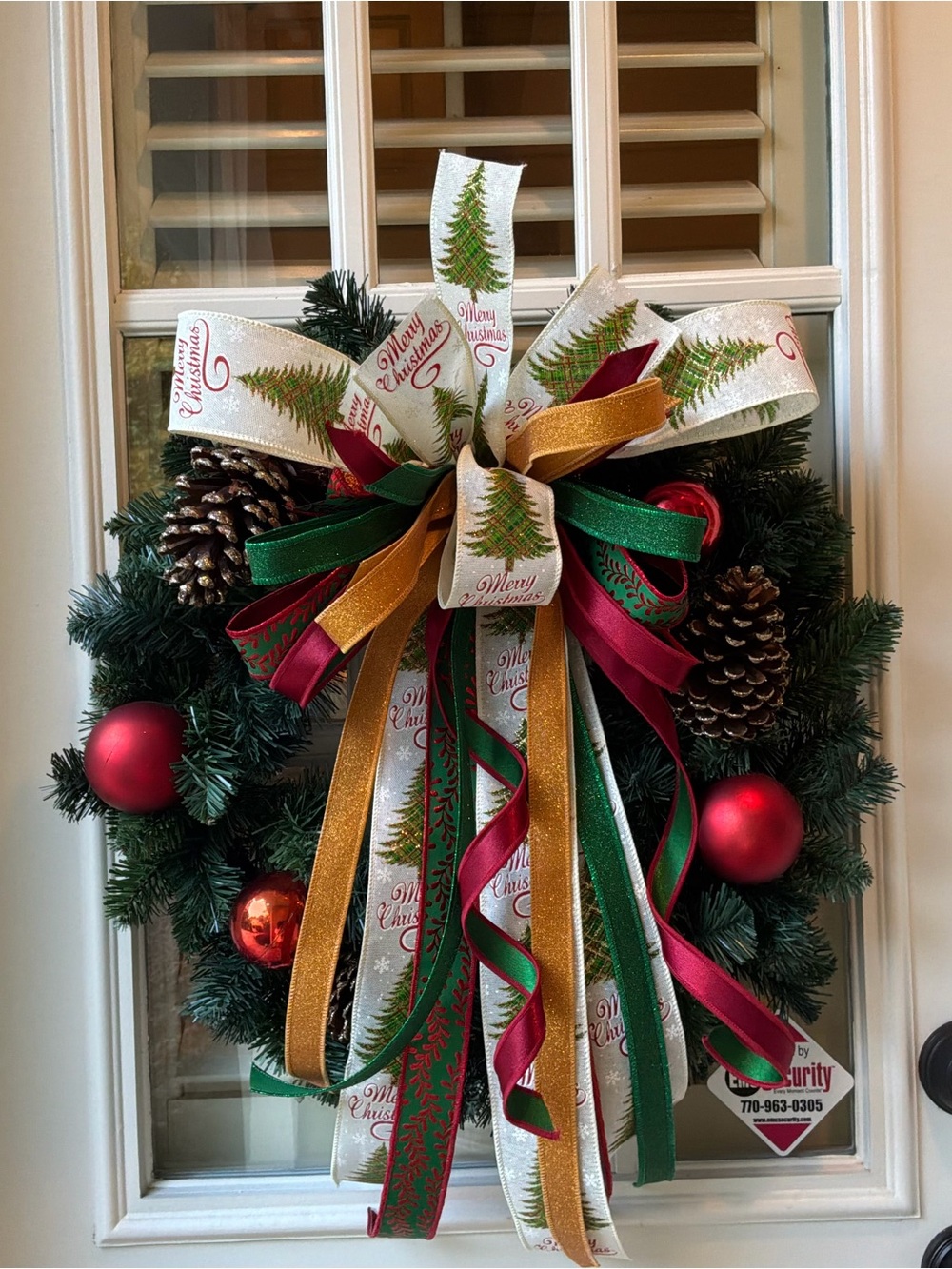 Festive Green Holiday Wreath with Red, Gold & Green Ribbon Bow